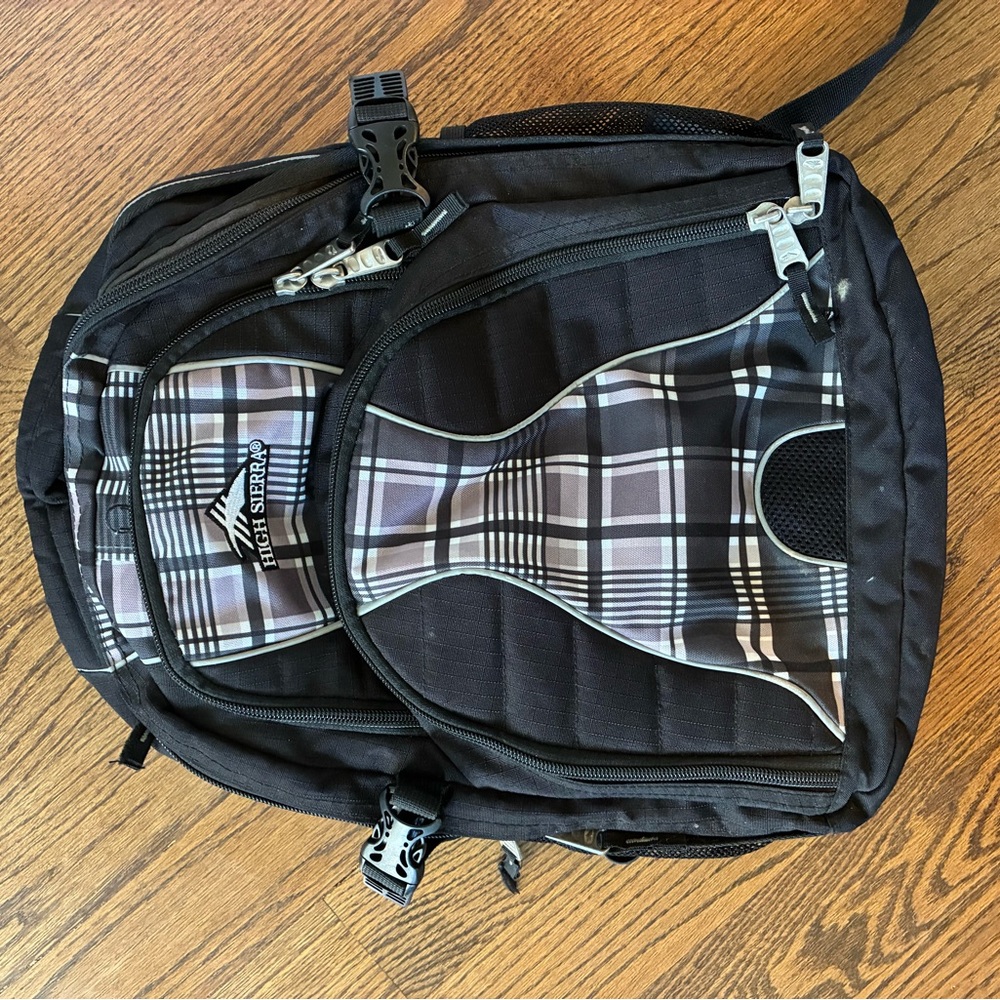 High Sierra Black and Gray Plaid Backpack never used however tags were removed